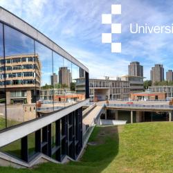 A picture of the university of essex with the university name over the sky in white text